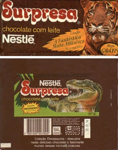 Os chocolates Surpresa vinham com cartões/ figurinha que apresentavam dinossauros de diferentes eras. Havia, também, um álbum bem bacana