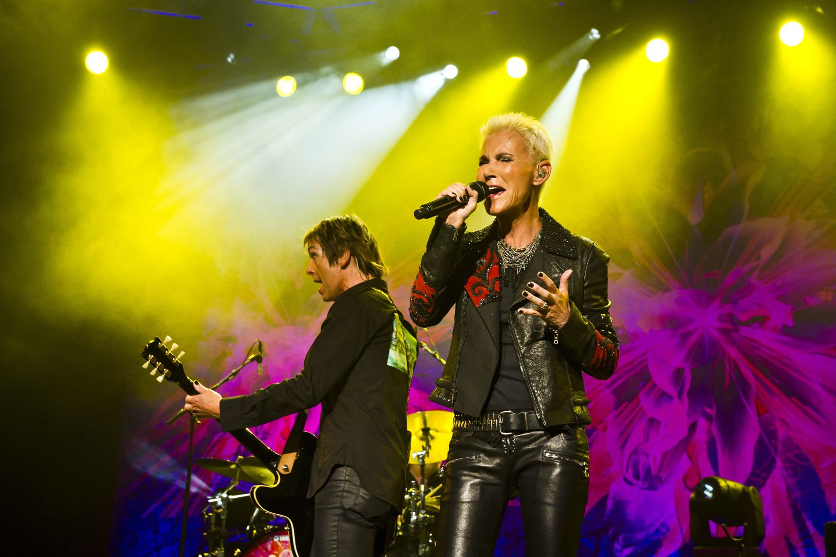 SUN CITY, SOUTH AFRICA - MAY 13:  (SOUTH AFRICA OUT) Marie Fredriksson and Per Gessle (L) of Swedish pop music duo Roxette performs at Sun City's Superbowl on May 13, 2011 in Sun City, near Rustenburg, South Africa. (Photo by Foto24/Gallo Images/Getty Images)