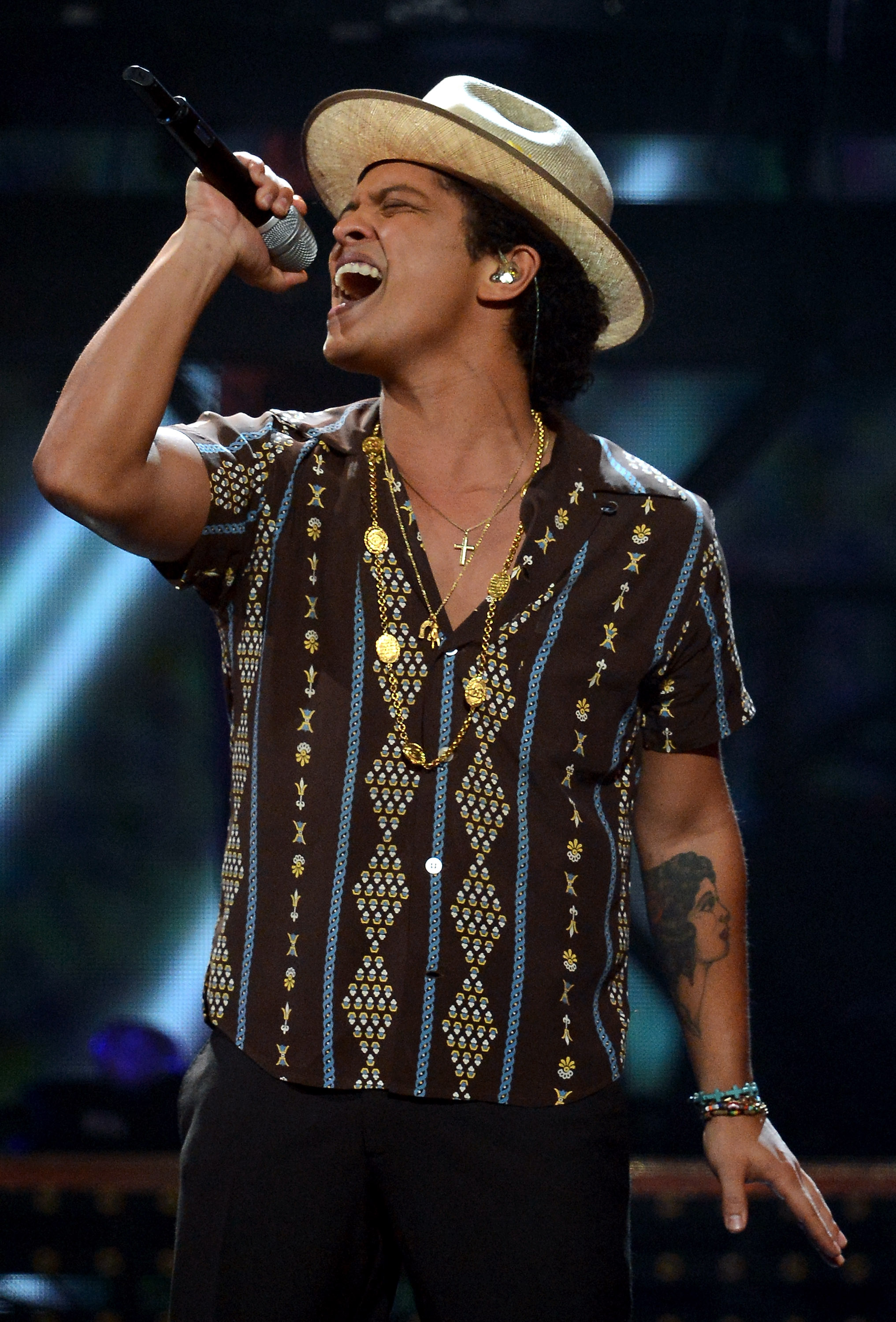 LAS VEGAS, NV - SEPTEMBER 21:  Recording artist Bruno Mars performs during the iHeartRadio Music Festival at the MGM Grand Garden Arena on September 21, 2013 in Las Vegas, Nevada.  (Photo by Ethan Miller/Getty Images for Clear Channel)