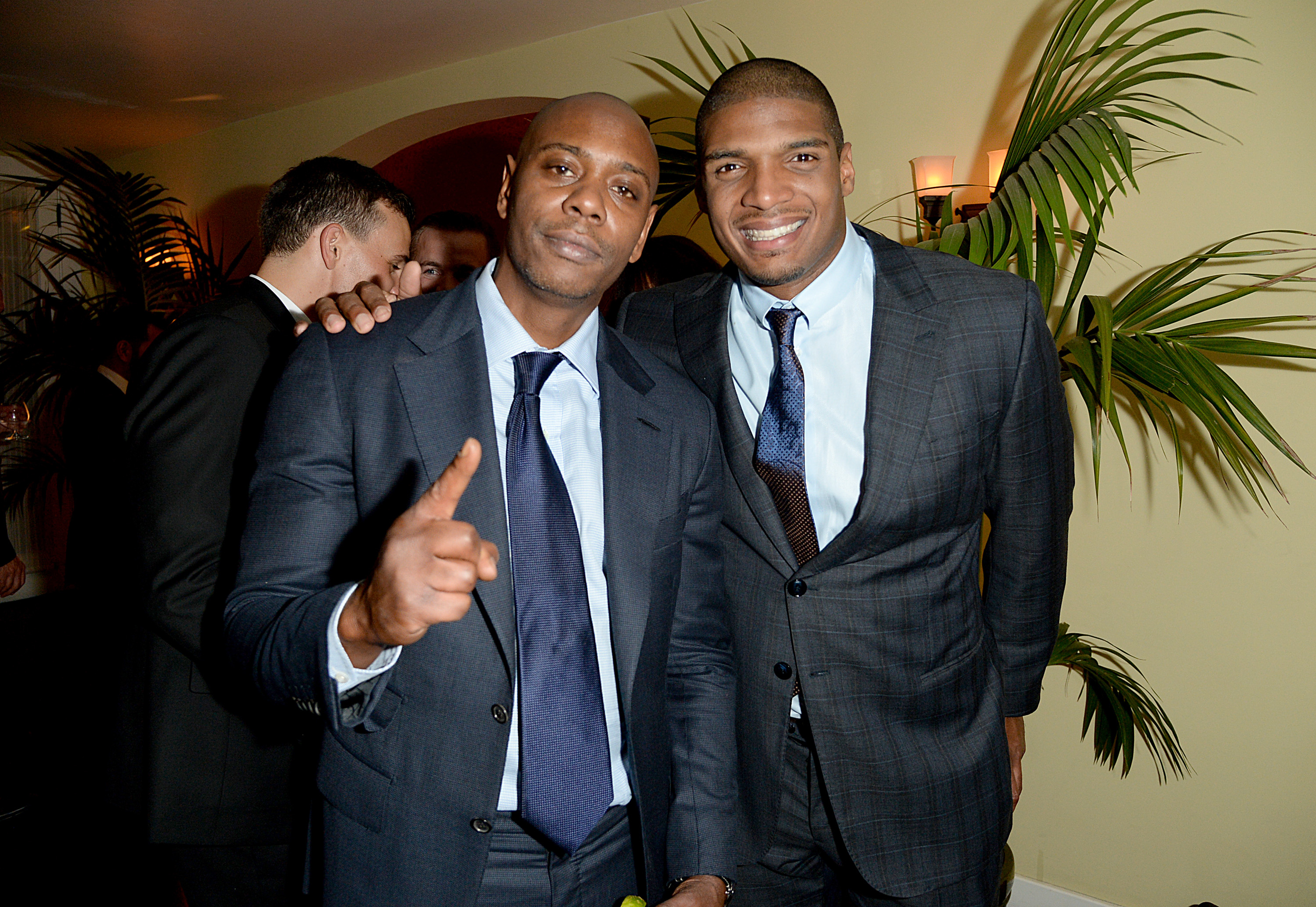 LOS ANGELES, CA - DECEMBER 04:  Comedian Dave Chappelle (L) and football player Michael Sam attend the 2014 GQ Men Of The Year party at Chateau Marmont on December 4, 2014 in Los Angeles, California.  (Photo by Jason Merritt/Getty Images for GQ)