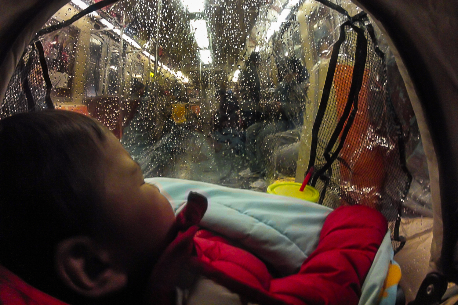 11/26/14 Going up to the A train at Rockaway Station way to Manhattan, rainy day, Ignacio just wake up