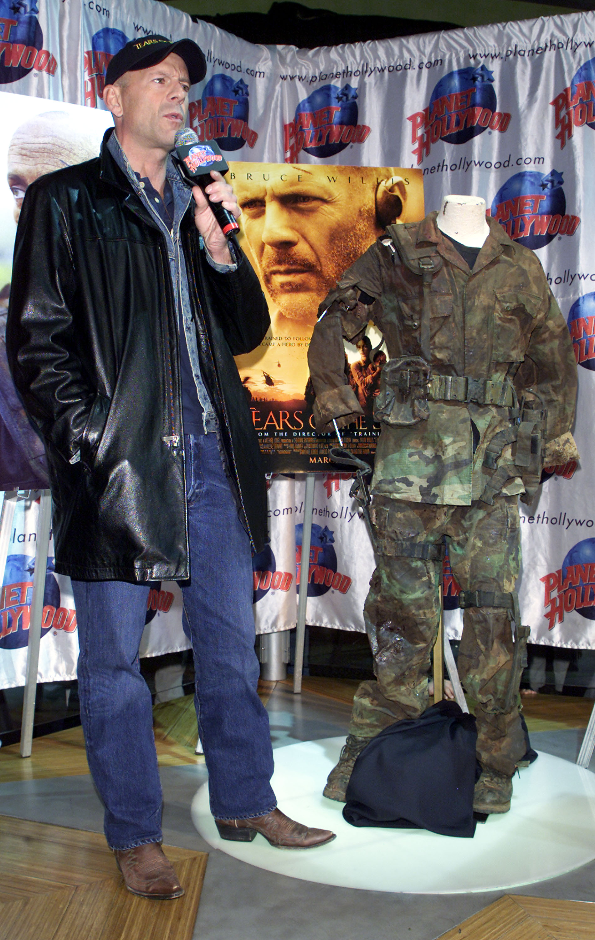 NEW YORK - FEBRUARY 26:  Actor Bruce Willis promotes his new movie "Tears of The Sun" at Planet Hollywood Times Square February 26, 2003 in New York City.  (Photo by Adam Rountree/Getty Images)