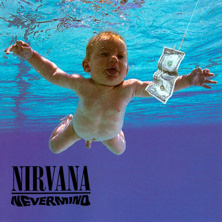 Todos conhecem a capa de 'Nevermind', certo? Mas, a princípio Kurt queria mesmo era uma mulher dando a luz na piscina, de forma bem nítida. Pensou se a ideia dele fosse aceita?