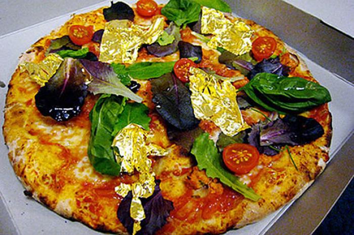 <strong>Quanto:</strong> Preço mínimo de R$ 6,3 milA <strong>pizza de trufas brancas e ouro </strong>da pizzaria Margo's, que fica em em Malta, tem preço variável: depende do valor das trufas no momento. Entre as coberturas, estão mossarela de búfala orgânica e folhas de ouro de 34 quilates.