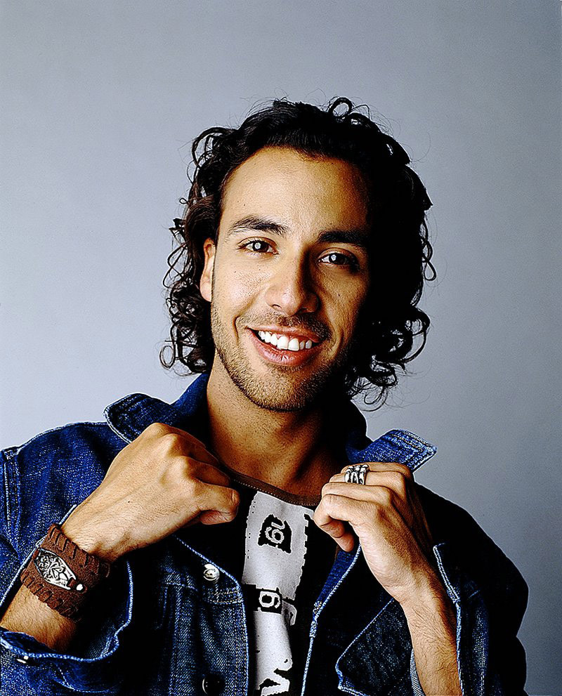 Ele é outro que teve sua educação musical vinda da igreja. Também participava de corais desde os seis anos de idade. Depois também teve seus momentos em programas da Nickelodeon e produziu uma peça chamada Macho & Camacho na faculdade.
