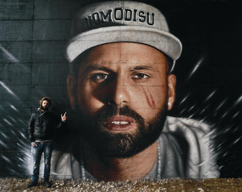 Italiano faz grafites hiper-realistas gigantes usando latas de spray