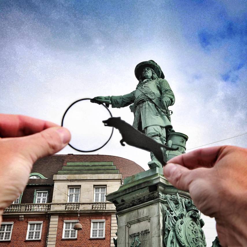 O inglês Rich McCor utiliza recortes de papel para 'transformar' pontos turísticos pela Europa