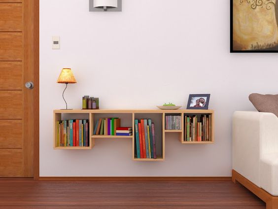 Organizar livros, vasos e qualquer outro item de decoração em estantes é uma maneira prática e delicada de ornamentar as paredes e dar um toque especial no décor.