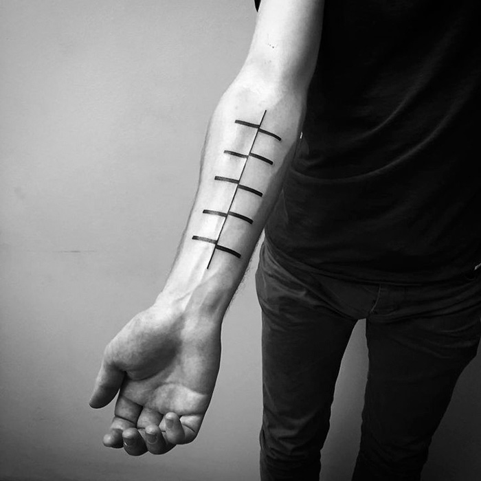 O artista russo Stanislaw Wilczynski cria tatuagens geométricas minimalistas de linhas retas e as batizou de 