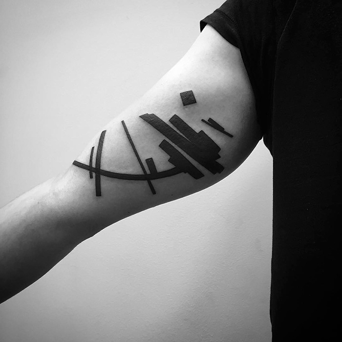 O artista russo Stanislaw Wilczynski cria tatuagens geométricas minimalistas de linhas retas e as batizou de 