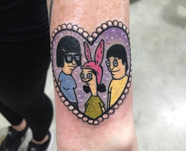 Os personagens Tina, Louise e Gene Belcher 