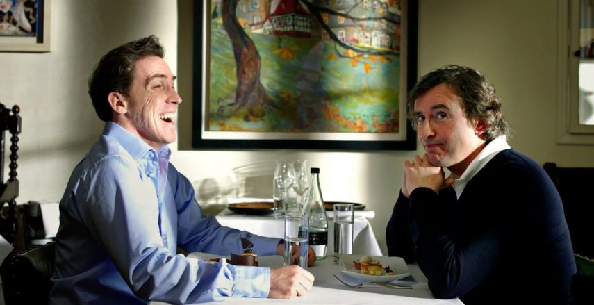 Em 2010, Steve Coogan e Rob Brydon estrelavam a série britânica The Trip e tiveram a oportunidade de torna-la um filme. A dupla, com a ajuda do diretor, Michael Winterbottom, em vez de fazer uma adaptação, resolveu apenas editar os seis episódios de modo que ele se tornasse um longa-metragem para ser lançado nos Estados Unidos, onde os atores não eram muito conhecidos. Em 2014, o trio se reuniu para a segunda temporada da série, que também foi transformada num filme, Viagem Para Itália (The Trip to Italy).