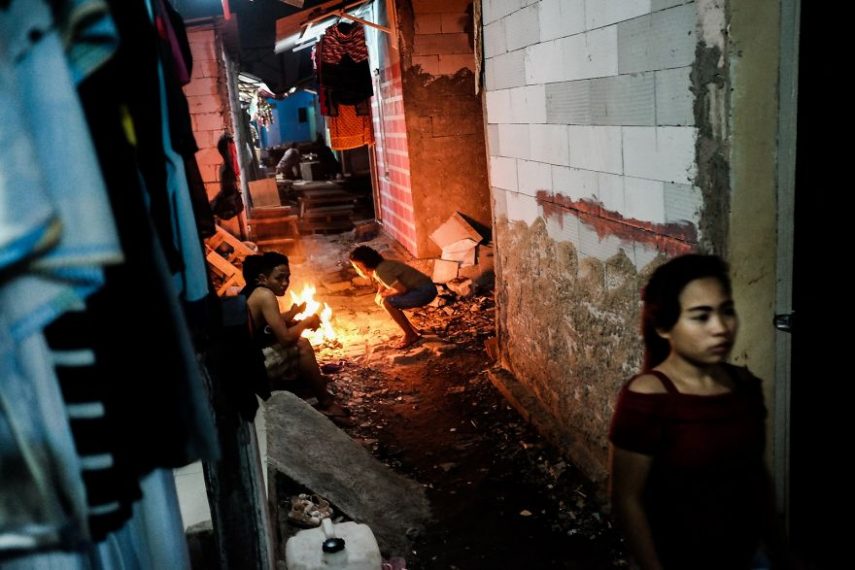 Fotógrafo Vytautas Jankulskas retratou com vivem as pessoas que moram nas favelas de Jacarta, na Indonésia