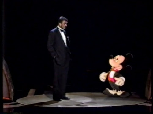 Em 1998, o personagem subiu ao palco para entregar um envelope ao ator Tom Selleck. Já em 2003, Mickey voltou a aparecer na cerimônia como animação ao lado da atriz Jennifer Garner.