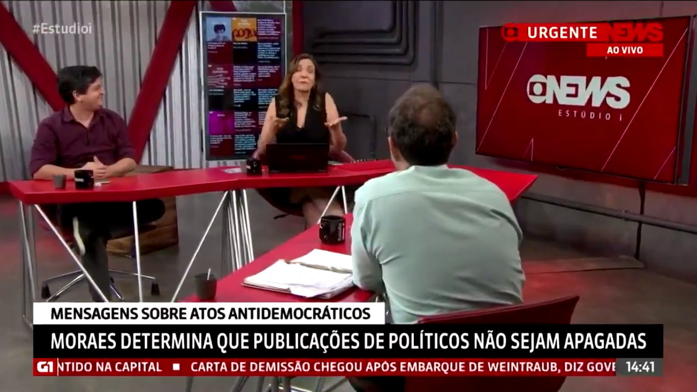 Jornalista Maria Beltrão dá bronca ao vivo em colega que mexia no celular